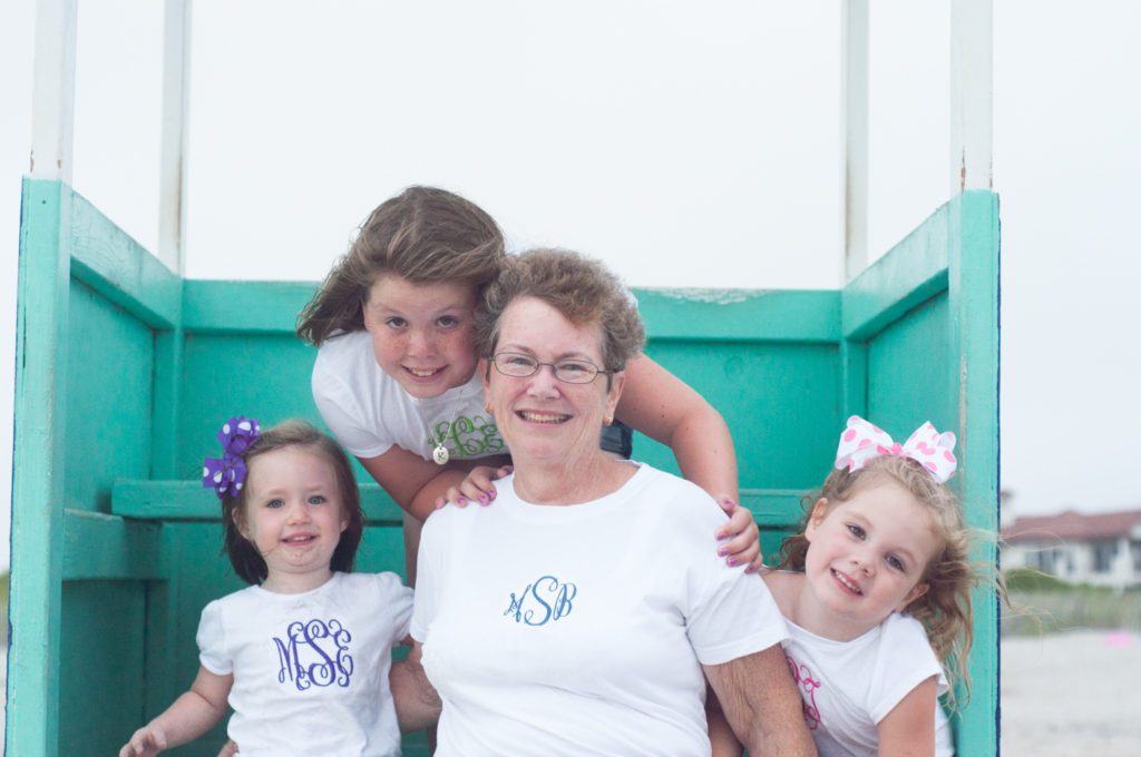 grandmother with the girls on beach